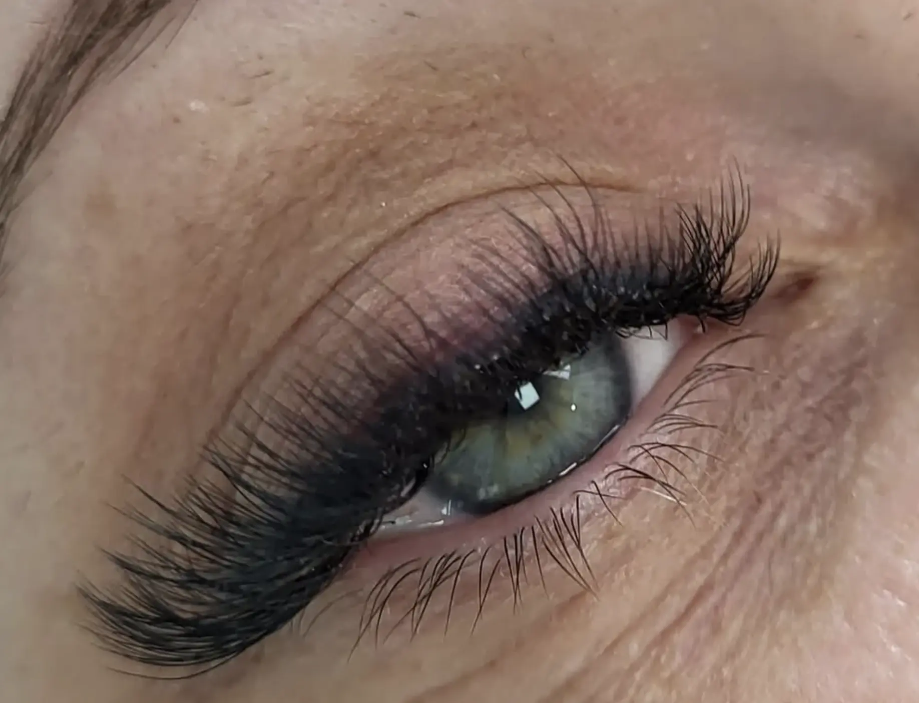 How do you remove gunk from eyelash extensions?